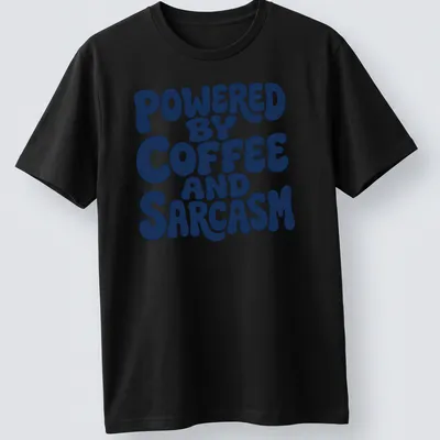Bold typography shirt with the quote 'Powered By Coffee And Sarcasm' in navy and white