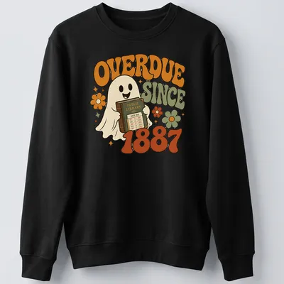Retro graphic of a ghost holding an overdue library book with colorful text — printed on a unisex sweatshirt