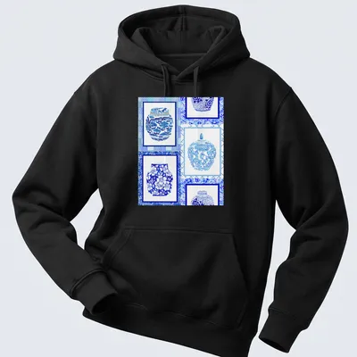 Patchwork illustration of blue and white ginger jars in a decorative design — printed on a unisex hoodie