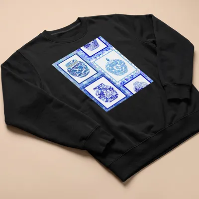 Patchwork illustration of blue and white ginger jars in a decorative design — printed on a unisex sweatshirt