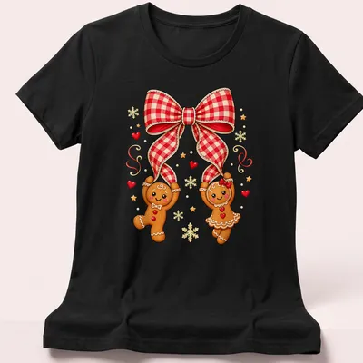 Kawaii gingerbread couple under a red plaid bow in festive colors — printed on a women's shirt