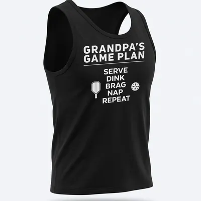 Bold typography design with the phrase Grandpa's Game Plan Serve Dink Brag Nap Repeat — printed on a tank top