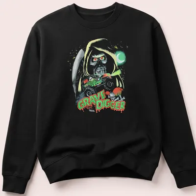 Halloween-themed Grave Digger monster truck graphic in green, red, black, and white — printed on a unisex sweatshirt