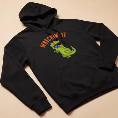 Playful illustration of a green dinosaur with the text WRECKIN' IT — printed on a unisex hoodie