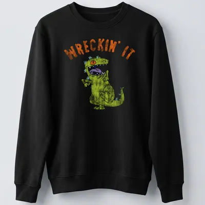 Playful illustration of a green dinosaur with the text WRECKIN' IT — printed on a unisex sweatshirt