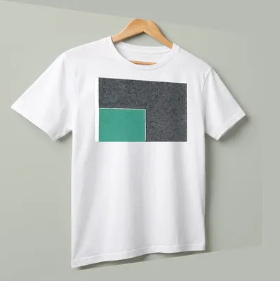 Textured green square design against a grey background on a t-shirt. — printed on a unisex t-shirt (angled view)