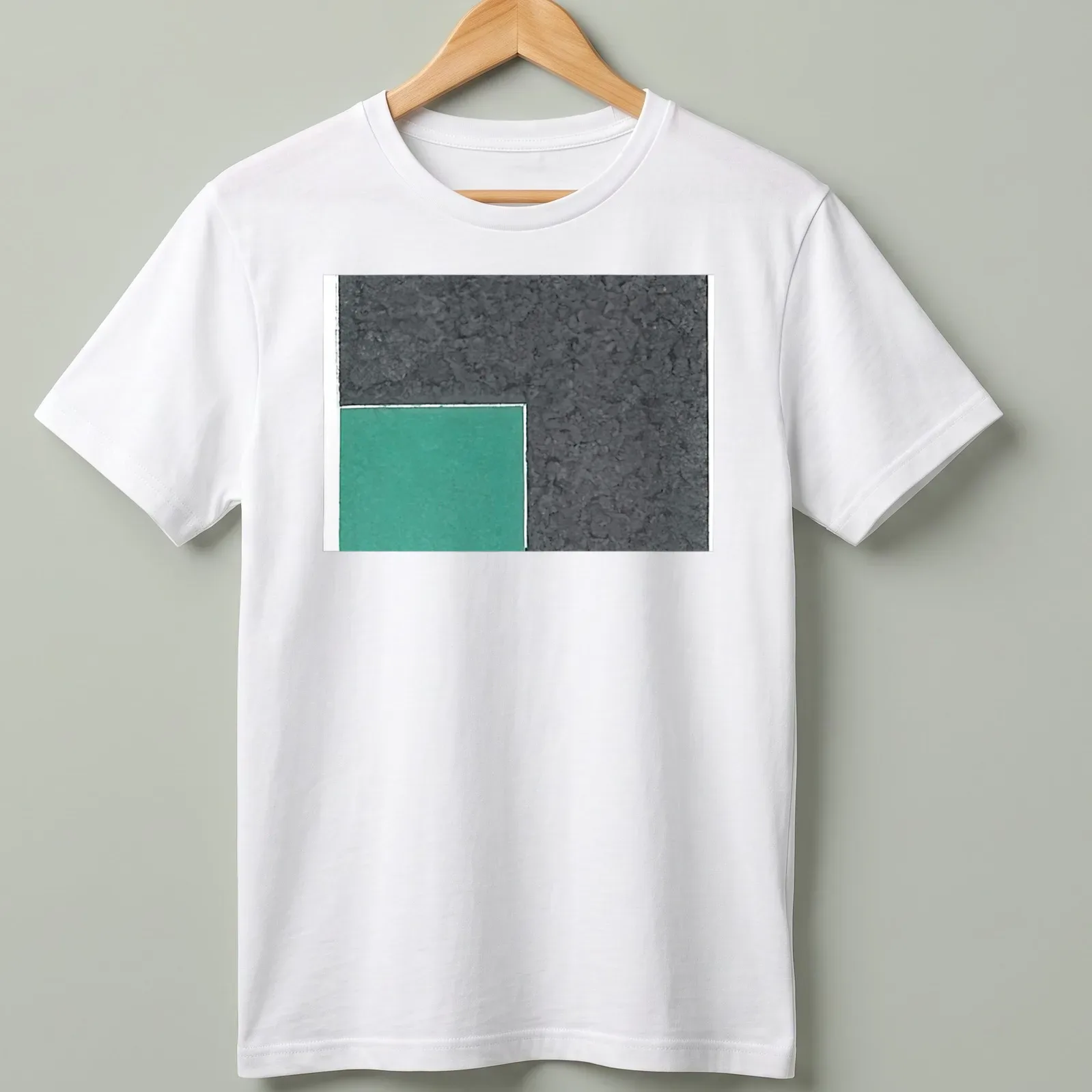 Textured green square design against a grey background on a t-shirt. — printed on a unisex t-shirt