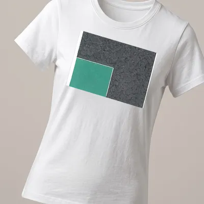 Textured green square design against a grey background on a t-shirt. — printed on a women's shirt