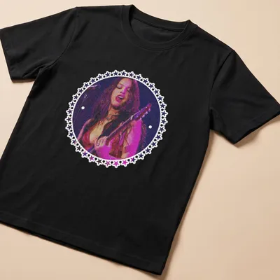 Vintage concert style Guts Tour t-shirt featuring a female guitarist in bold colors