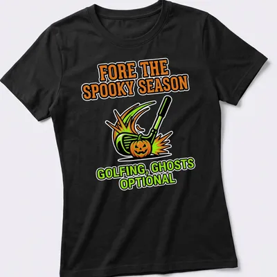 Cartoon t-shirt depicting a golf club and pumpkin with playful Halloween text — printed on a women's shirt