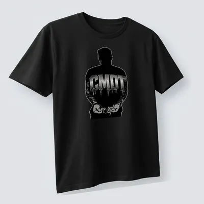 Urban streetwear t-shirt featuring a handcuffed silhouette and CMDT text in black and silver — printed on a unisex t-shirt (angled view)
