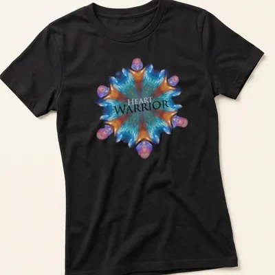 Colorful mandala-inspired Heart Warrior t-shirt with vibrant abstract design — printed on a women's shirt