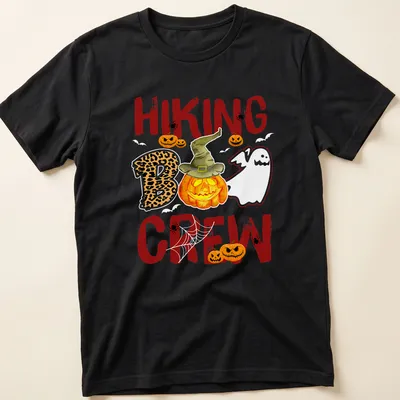 Playful cartoon design of a pumpkin and ghost for Halloween — printed on a unisex t-shirt