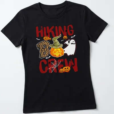 Playful cartoon design of a pumpkin and ghost for Halloween — printed on a women's shirt