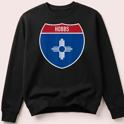 Hobbs New Mexico highway sign t-shirt in shield design with blue, red, and white colors — printed on a unisex sweatshirt