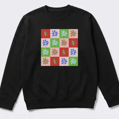 Colorful grid pattern featuring holly leaves and berries for Christmas — printed on a unisex sweatshirt