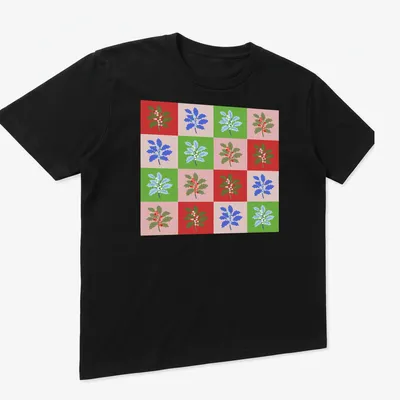 Colorful grid pattern featuring holly leaves and berries for Christmas — printed on a unisex t-shirt (angled view)