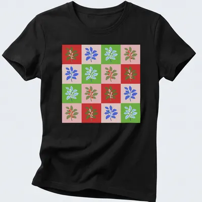 Colorful grid pattern featuring holly leaves and berries for Christmas — printed on a women's shirt