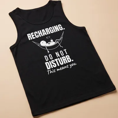 Funny typography tee showing a person relaxing in a hammock with a do not disturb message. — printed on a tank top