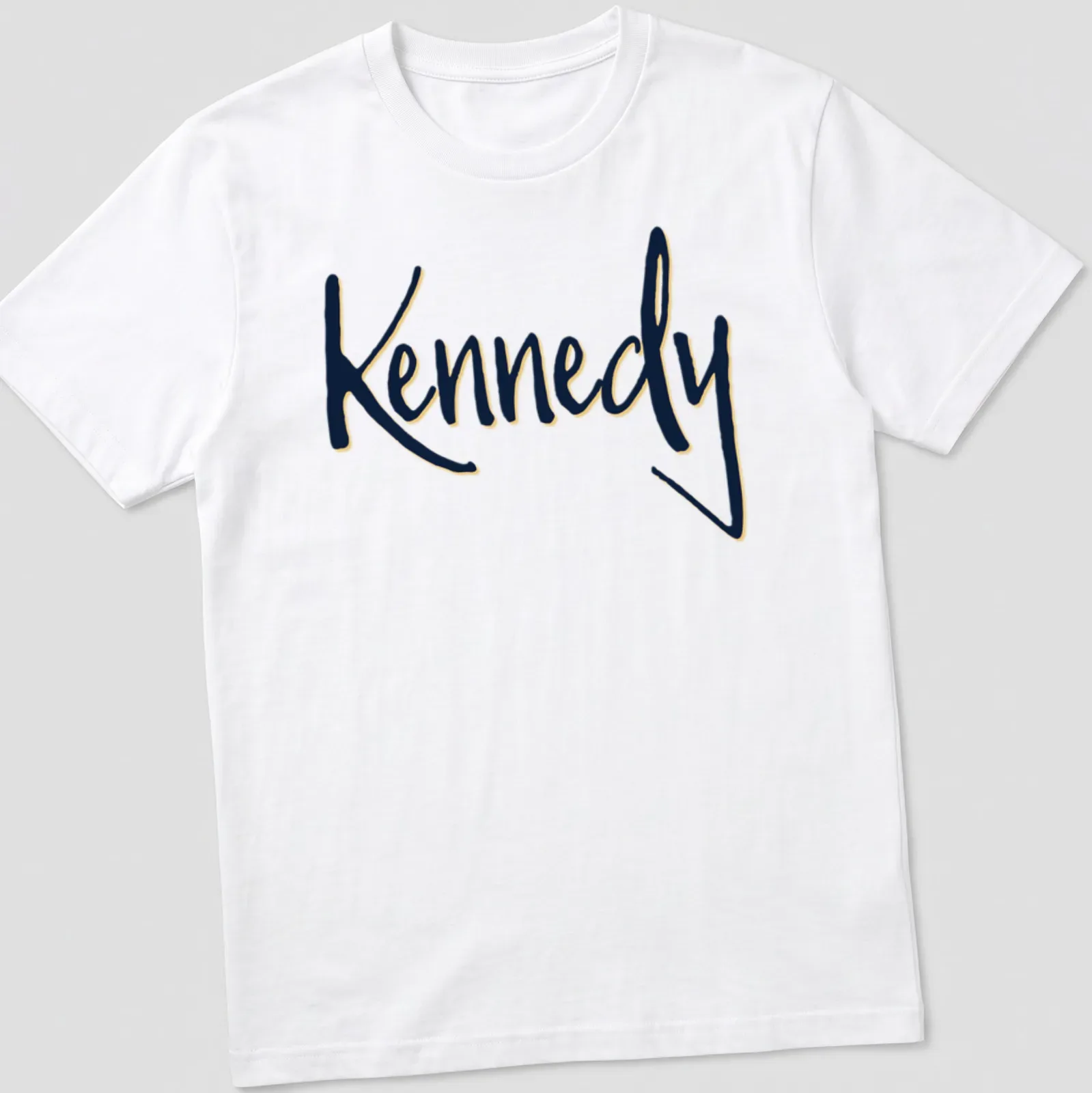 Elegant script shirt featuring the name Kennedy in gold on navy blue — printed on a unisex t-shirt