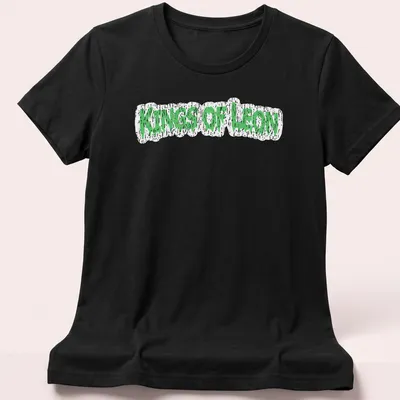 Grunge-style Kings Of Leon t-shirt with green dripping text design — printed on a women's shirt