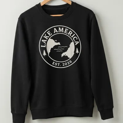 Vintage seal design featuring Lake America Est. 2026 in light beige and white — printed on a unisex sweatshirt