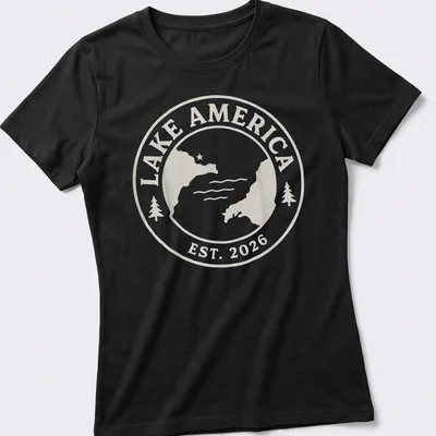 Vintage seal design featuring Lake America Est. 2026 in light beige and white — printed on a women's shirt
