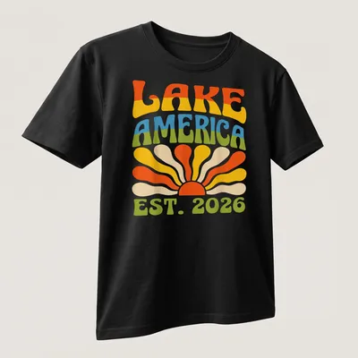 Retro vintage Lake America t-shirt featuring a sunset design with vibrant colors — printed on a unisex t-shirt (angled view)