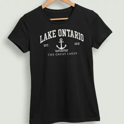 Vintage nautical t-shirt featuring an anchor and Lake Ontario text in white and light gray — printed on a women's shirt