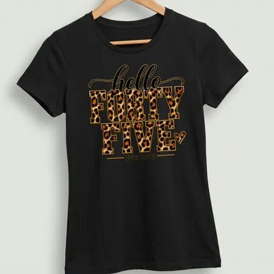 Leopard print text reading 'hello FORTY FIVE EST. 1981' in bold colors. — printed on a women's shirt