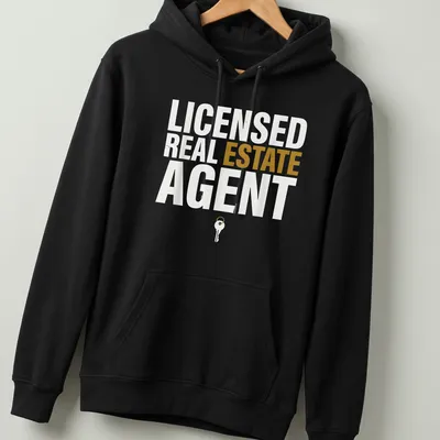Licensed Real Estate Agent t-shirt featuring bold typography and a key graphic. — printed on a unisex hoodie