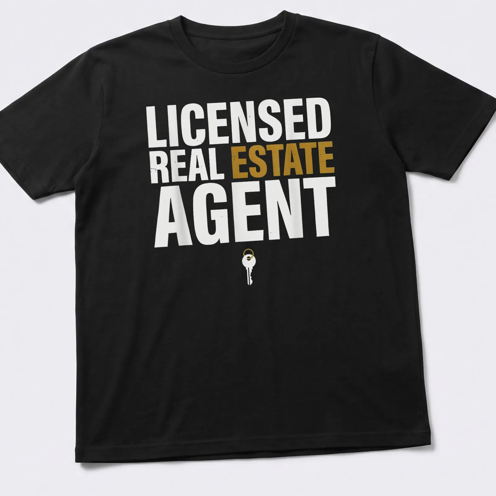 Licensed Real Estate Agent t-shirt featuring bold typography and a key graphic. — printed on a unisex t-shirt