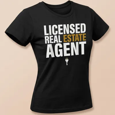 Licensed Real Estate Agent t-shirt featuring bold typography and a key graphic. — printed on a women's shirt