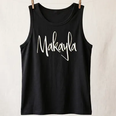 Elegant script t-shirt featuring the name Makayla in gold on white — printed on a tank top
