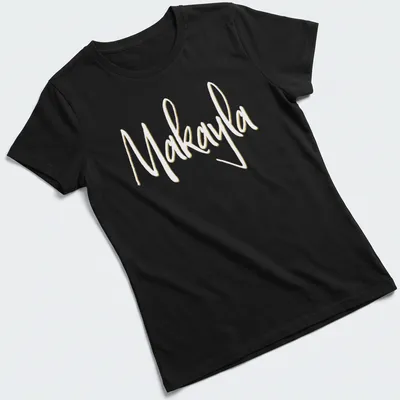 Elegant script t-shirt featuring the name Makayla in gold on white — printed on a women's shirt
