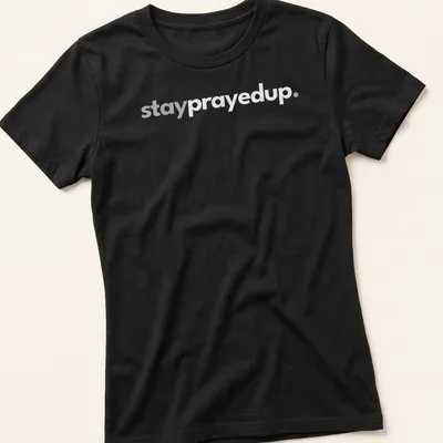 Minimalist design featuring the phrase stay prayed up in white and gray — printed on a women's shirt