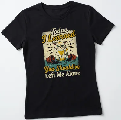 Vintage distressed shirt featuring a mischievous cat and a humorous quote about feline antics — printed on a women's shirt