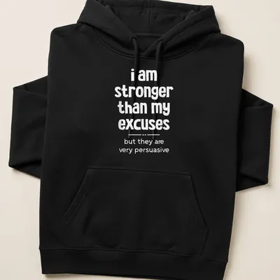 Bold typography with motivational phrase about excuses in white text — printed on a unisex hoodie