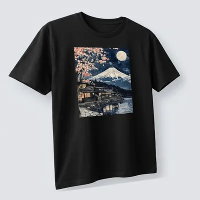 Japanese woodblock style Mount Fuji scene with sakura trees under moonlight — printed on a unisex t-shirt (angled view)