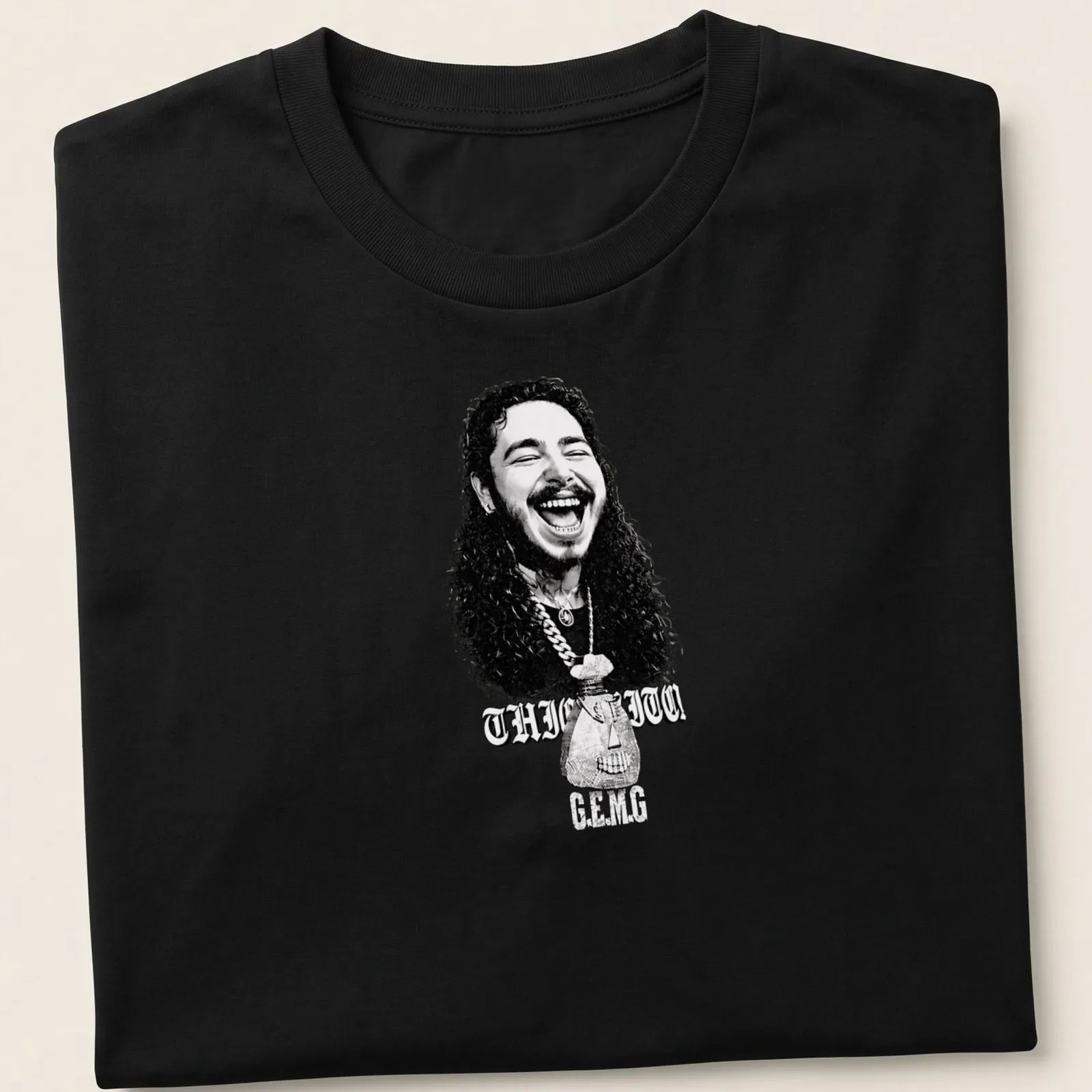 Black and white illustration of a smiling man with curly hair and text THIC ITO C.E.M.G — printed on a unisex t-shirt