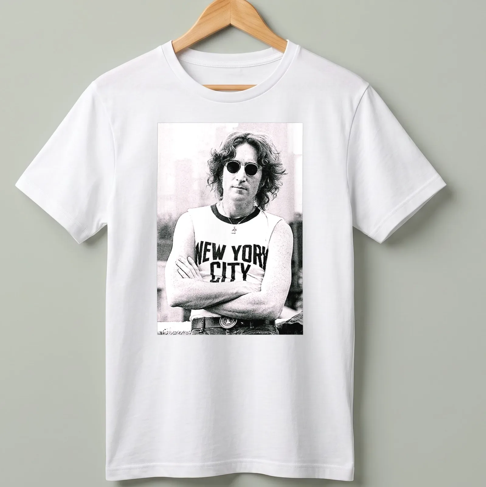 Black and white photograph of John Lennon with 'New York City' text — printed on a unisex t-shirt