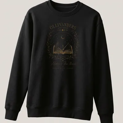 Vintage illustration of Ollivanders with wand and book in gold and cream — printed on a unisex sweatshirt