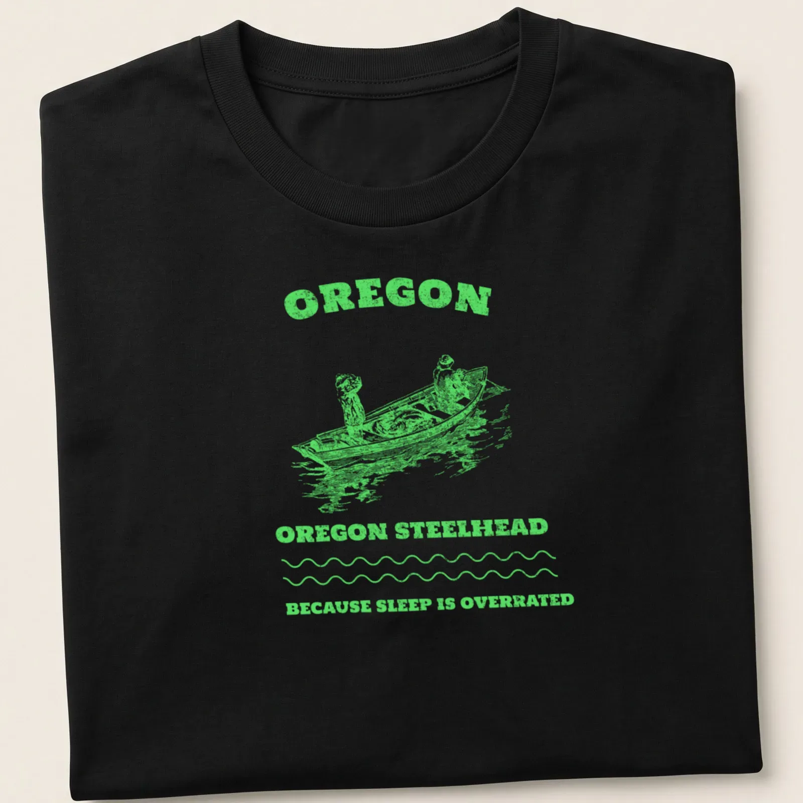 Vintage illustration of anglers on a fishing boat with text about Oregon steelhead fishing — printed on a unisex t-shirt