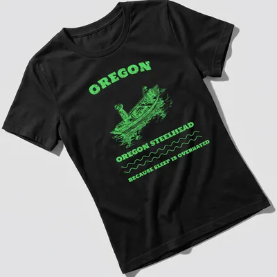 Vintage illustration of anglers on a fishing boat with text about Oregon steelhead fishing — printed on a women's shirt
