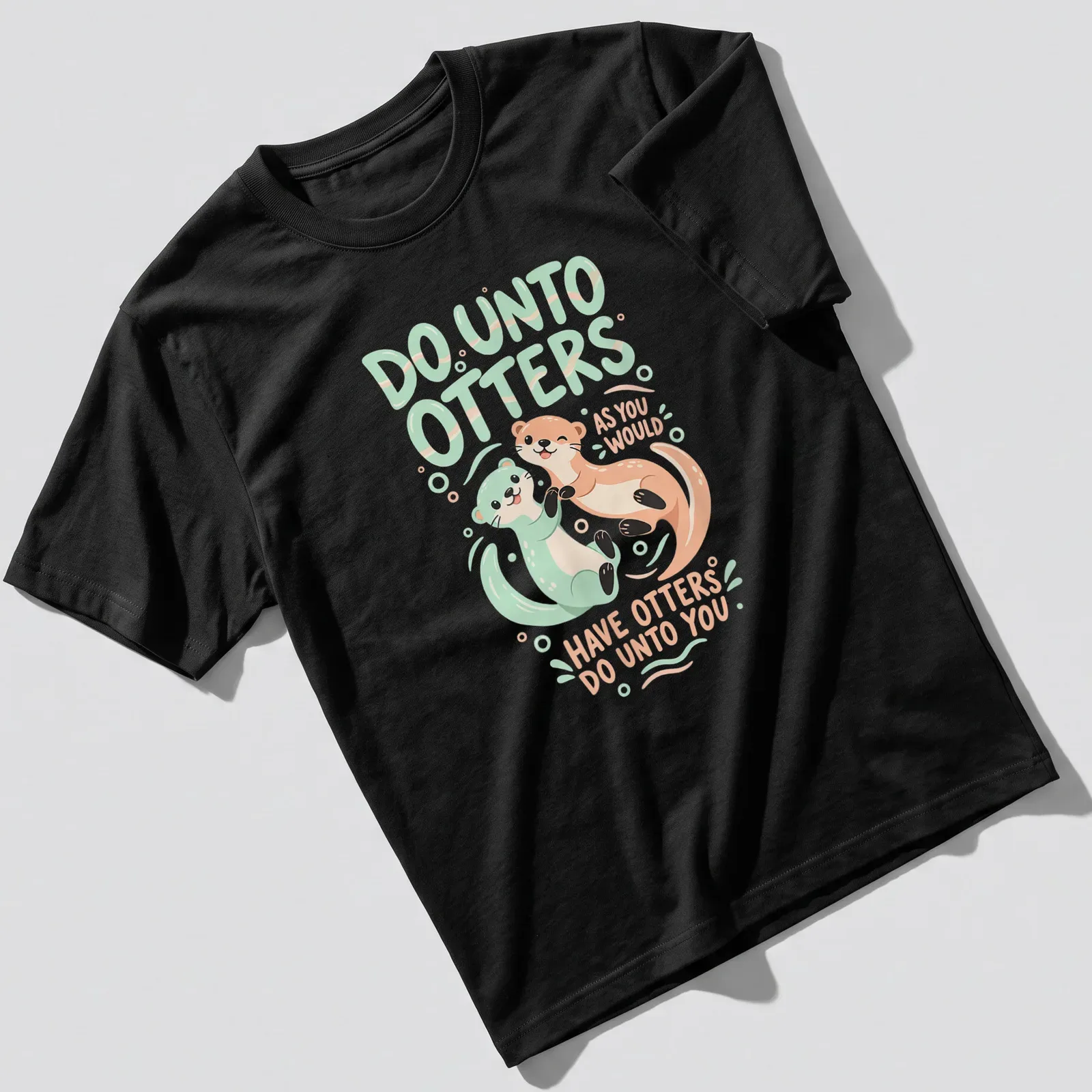 Kawaii otter illustration with a playful quote in soft colors on a — printed on a unisex t-shirt