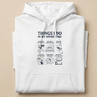 Line-art design featuring a Papillon dog with humorous text about dog activities — printed on a unisex hoodie