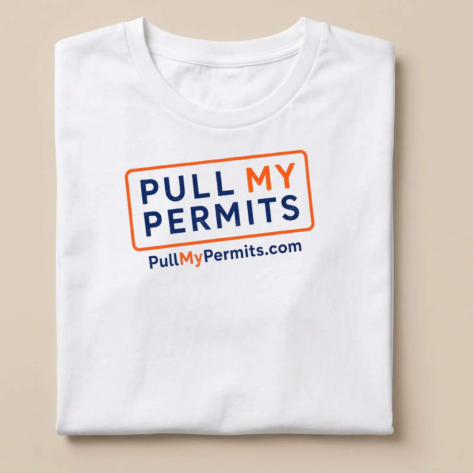 Bold typography shirt with 'Pull My Permits' text in orange and navy blue — printed on a unisex t-shirt