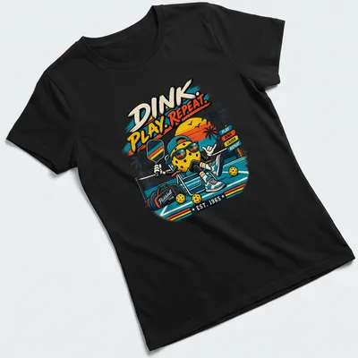 Retro vintage pickleball graphic featuring 'DINK. PLAY. REPEAT.' — printed on a women's shirt