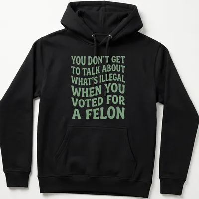 Bold political commentary t-shirt with playful typography in green and white — printed on a unisex hoodie