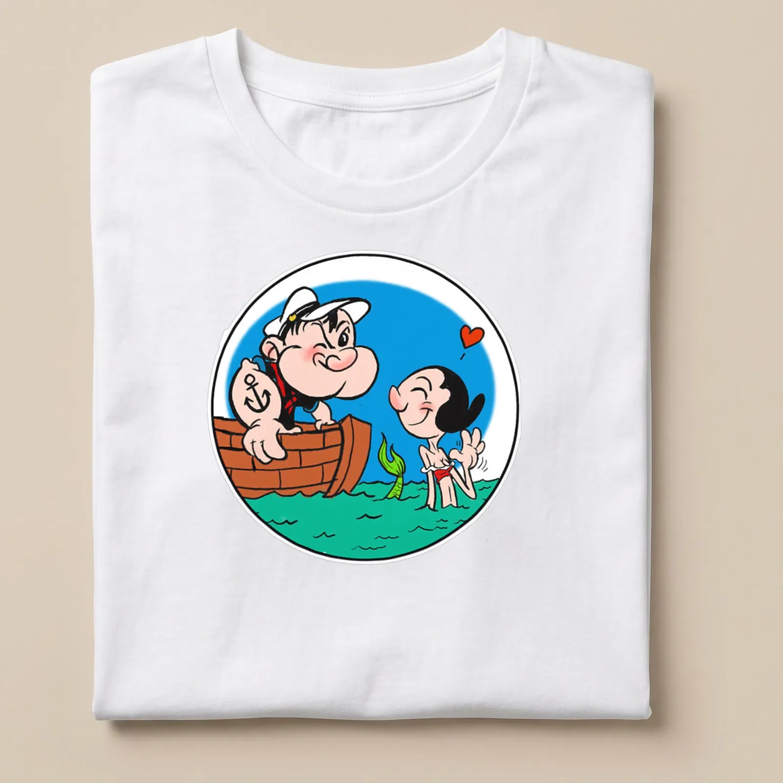 Cartoon illustration of Popeye and Olive Oyl as mermaids in vibrant colors — printed on a unisex t-shirt